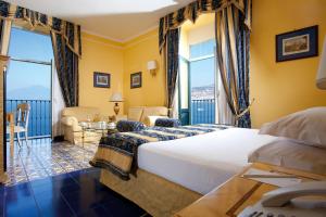 Cama ou camas em um quarto em Imperial Hotel Tramontano