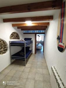 Postel nebo postele na pokoji v ubytování Cal Jardiner