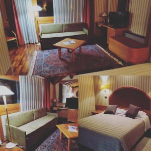 Al Giardino في Fanna: غرفة في الفندق بها سرير واريكة وطاولة