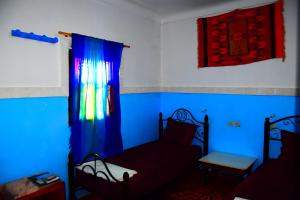 Giường trong phòng chung tại Gîte Tamsoulte