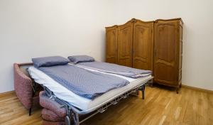 Postel nebo postele na pokoji v ubytování Tiltų 5 Studio