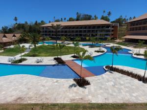 an aerial view of a resort with a pool at Ecoresort flat EM223 e EM26 in Praia dos Carneiros