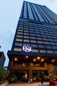 a tall building with the rbs logo on it at EST Bangsar KL Sentral by Greater Stay in Kuala Lumpur