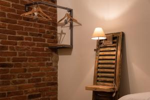A bed or beds in a room at Acini e Rose