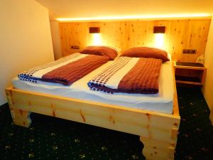 Postel nebo postele na pokoji v ubytování Haus Alpenfriede + 37 fotografií