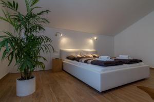 Posteľ alebo postele v izbe v ubytovaní Villa Royal + 37 fotografií