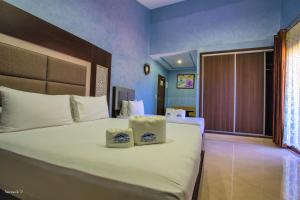 Ένα ή περισσότερα κρεβάτια σε δωμάτιο στο Hotel Jibal Chaouen