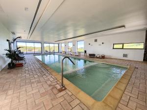 Baseinas apgyvendinimo įstaigoje Monte Do Malhao - Art, Eco & Spa arba netoliese