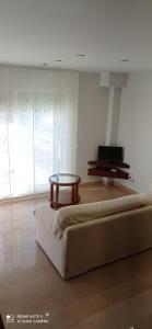 Khu vực ghế ngồi tại Casa Familiar Vacaciones