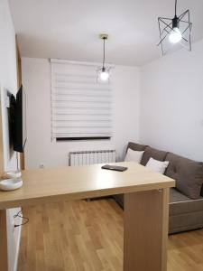 Posezení v ubytování APARTMANI POLARIS JAHORINA