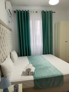 Postel nebo postele na pokoji v ubytování Hotel Jurgen