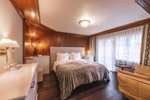 Voodi või voodid majutusasutuse Boutique Hotel Albana Real - Restaurants & Spa toas
