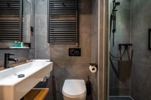 Koupelna v ubytování Hotel Zeezicht