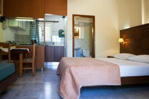 Posteľ alebo postele v izbe v ubytovaní Summer Garden Αpartments & Studios