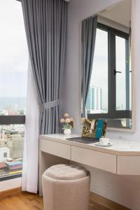 Area soggiorno di Calix Hotel Da Nang Beach