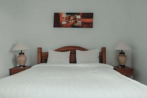 Voodi või voodid majutusasutuse Sekar Arum Riverside Resort in Canggu toas