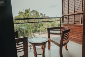 Rõdu või terrass majutusasutuses Sekar Arum Riverside Resort in Canggu
