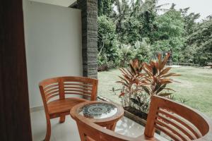 Zahrada ubytování Sekar Arum Riverside Resort in Canggu + 37 fotografií