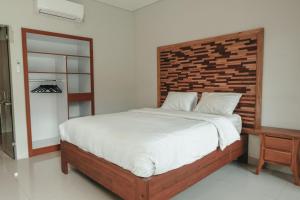Voodi või voodid majutusasutuse Sekar Arum Riverside Resort in Canggu toas