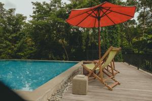 Bazén v ubytování Sekar Arum Riverside Resort in Canggu nebo v jeho okolí