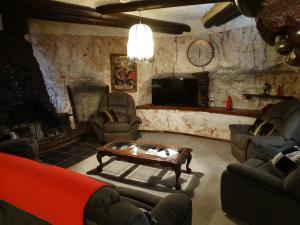 a living room with a couch and a coffee table at Di's Place in Coober Pedy