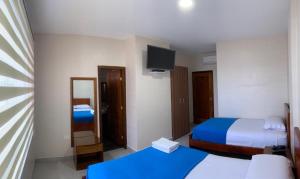 Postel nebo postele na pokoji v ubytování Hotel Arena Blanca