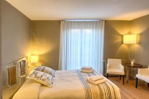 Postel nebo postele na pokoji v ubytování Hotel-Spa Classic Begur