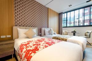 Voodi või voodid majutusasutuse Mucun Hot Spring Resort toas