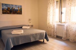 Postel nebo postele na pokoji v ubytování B&B Audafra
