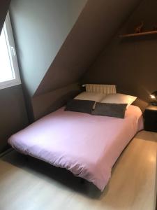 Postel nebo postele na pokoji v ubytování Maison bord de mer normandie
