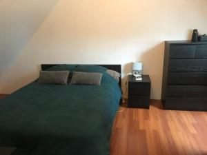 Postel nebo postele na pokoji v ubytování Maison bord de mer normandie