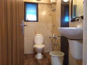 Koupelna v ubytování Hotel Metro Palace Bandra