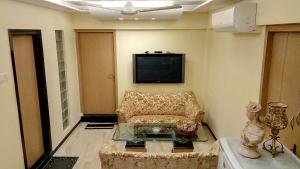 TV a/nebo společenská místnost v ubytování Hotel Metro Palace Bandra