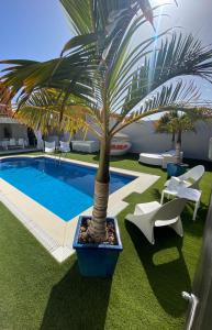 Bazén v ubytovaní Olivia Holidayhouse Maspalomas alebo v jeho blízkosti