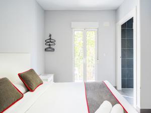 Postel nebo postele na pokoji v ubytování Hostal Jireh