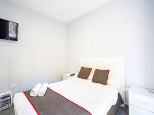 Postel nebo postele na pokoji v ubytování Hostal Jireh