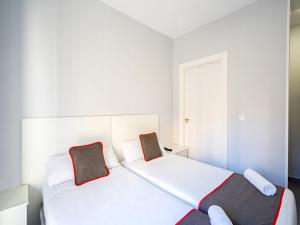 Postel nebo postele na pokoji v ubytování Hostal Jireh