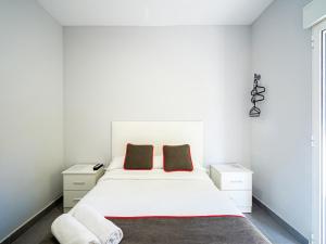 Postel nebo postele na pokoji v ubytování Hostal Jireh