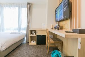 Sjónvarps- og/eða afþreyingartæki á Henn na Hotel Premier Kyoto Eki Hachijoguchimae