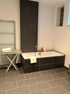 Ein Badezimmer in der Unterkunft Stadtloft Südermarkt