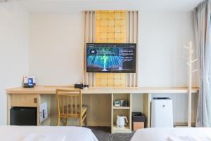 Rúm í herbergi á Henn na Hotel Premier Kyoto Eki Hachijoguchimae