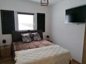Postel nebo postele na pokoji v ubytování Appartements Bergliebe