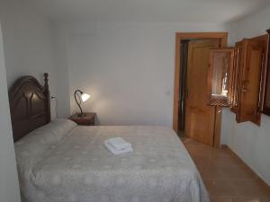 Posteľ alebo postele v izbe v ubytovaní CASA SAMPEDRO