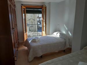 Posteľ alebo postele v izbe v ubytovaní CASA SAMPEDRO
