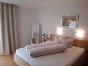 Posteľ alebo postele v izbe v ubytovaní Landhaus Klausnerhof Hotel Garni