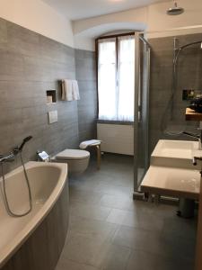 Koupelna v ubytování Hotel Stüa Granda