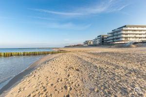 Photo de la galerie de l'établissement Apartament Grey Sand - Gardenia Seaside Dziwnów, à Dziwnów