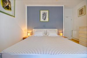 Posteľ alebo postele v izbe v ubytovaní Art Apartments Postira