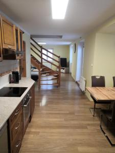 Kuchyň nebo kuchyňský kout v ubytování Apartment Lipno Šumava pro 8 hostů