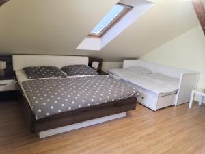 Postel nebo postele na pokoji v ubytování Apartment Lipno Šumava pro 8 hostů